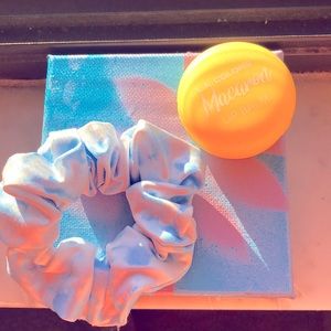 A set of a lip balm.  A scrunching and a painting